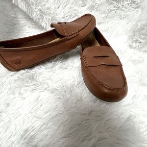 Brown leather flats